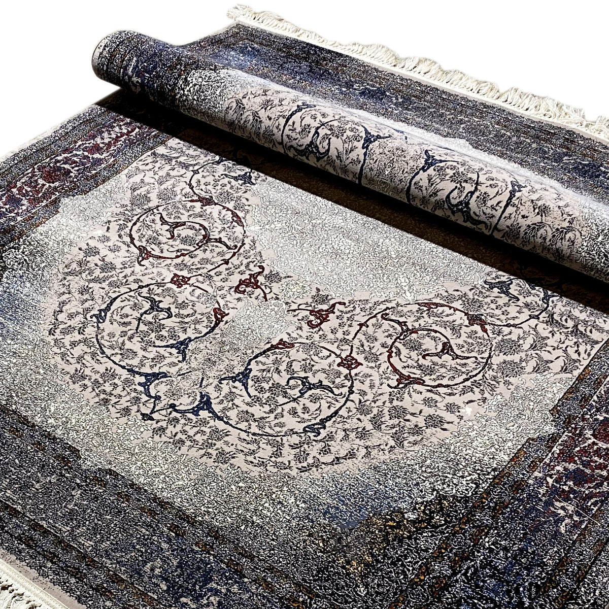 Teppich Sofia 160x230 cm, Nahansicht der Bordüre; dunkler Rahmen, graues Ornamentfeld
