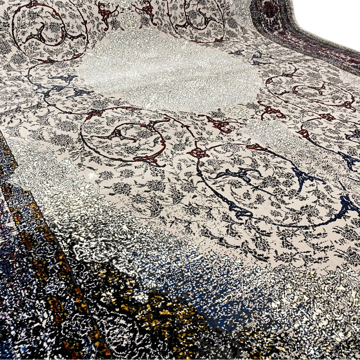 Teppich Sofia 160x230 cm, Detail der Textur mit feinem Glanz; ornamentales Muster im Zentrum