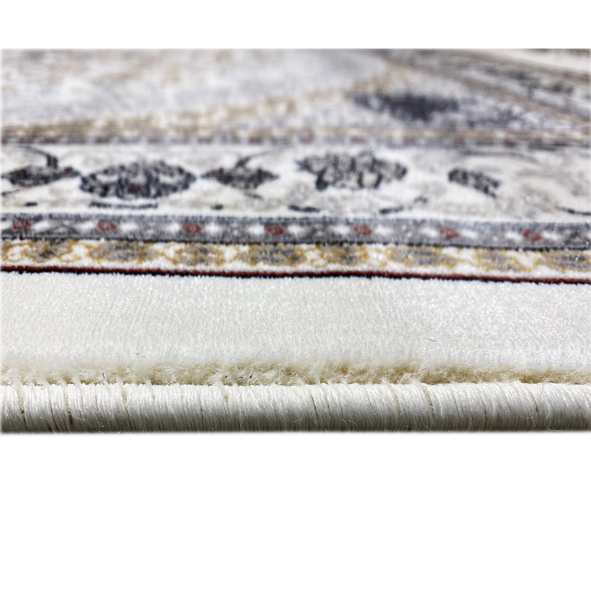 Orient-Teppich-Einfassung mit Fransen, cremefarbene Basis, dunkelblau/goldene Ornamente
