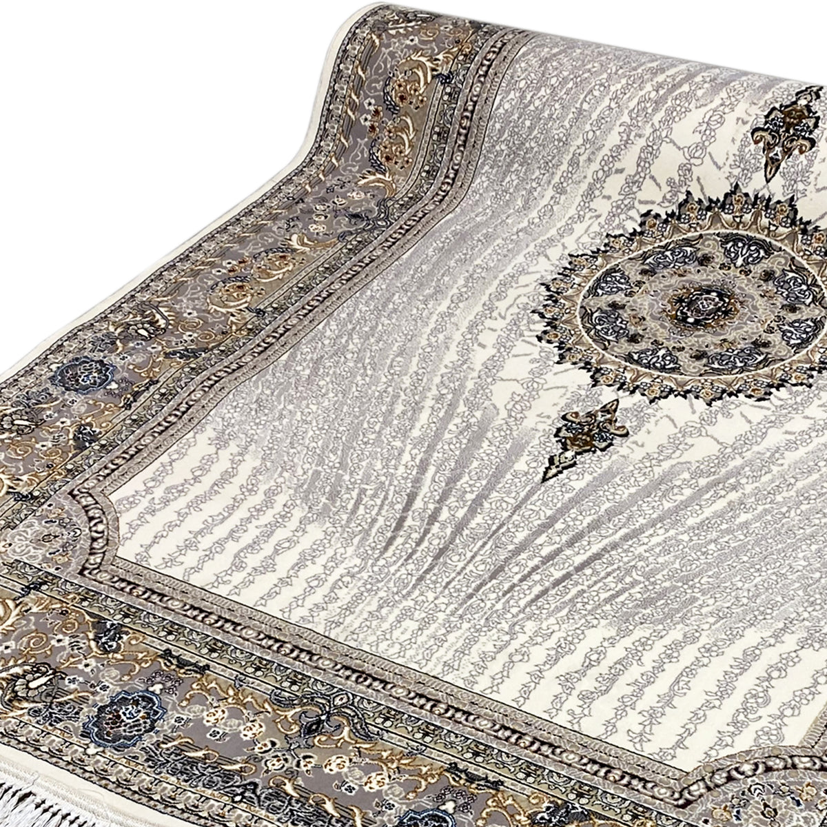 Teppich Elara 160x230 Nahansicht: cremefarbener Flor mit Medaillon und blau-goldenen Linien