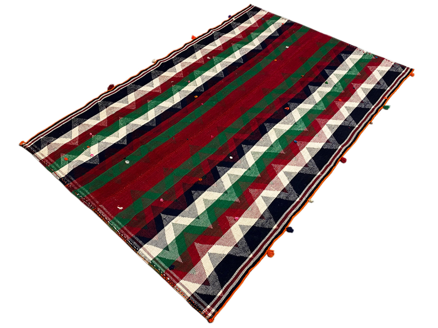 Wohnzimmer lebendiger Jajim Teppich handgefertigt im geometrischen Stil